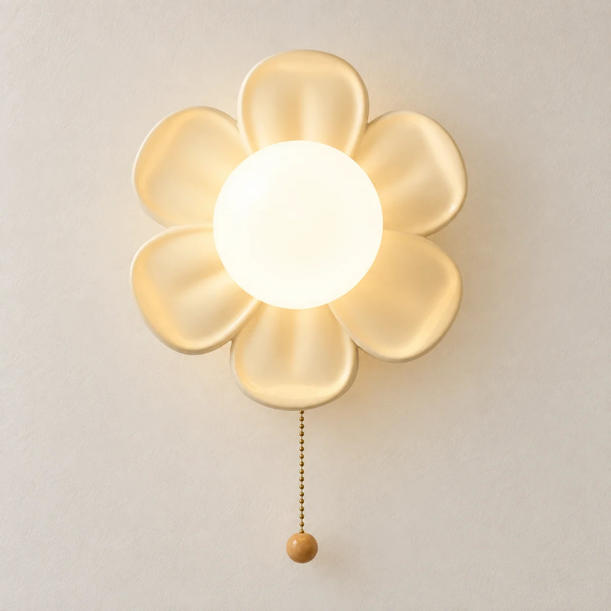 Cream Yellow Lorien six-petal resin flower wall sconce with pull chain